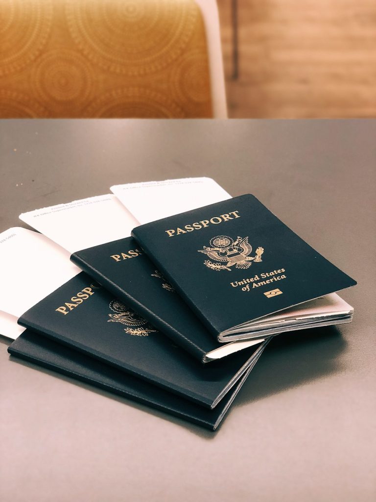 four-green-passports-hid-yhommog